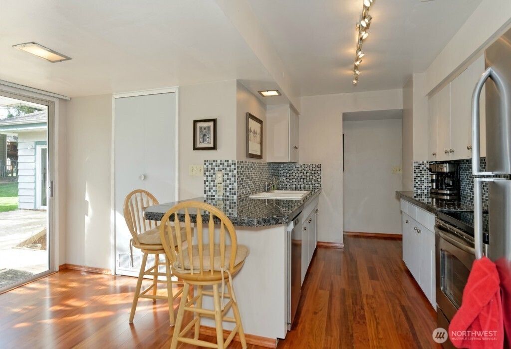 Photo of 10221 132nd Avenue NE, Kirkland, WA 98033 (MLS # 2458968)