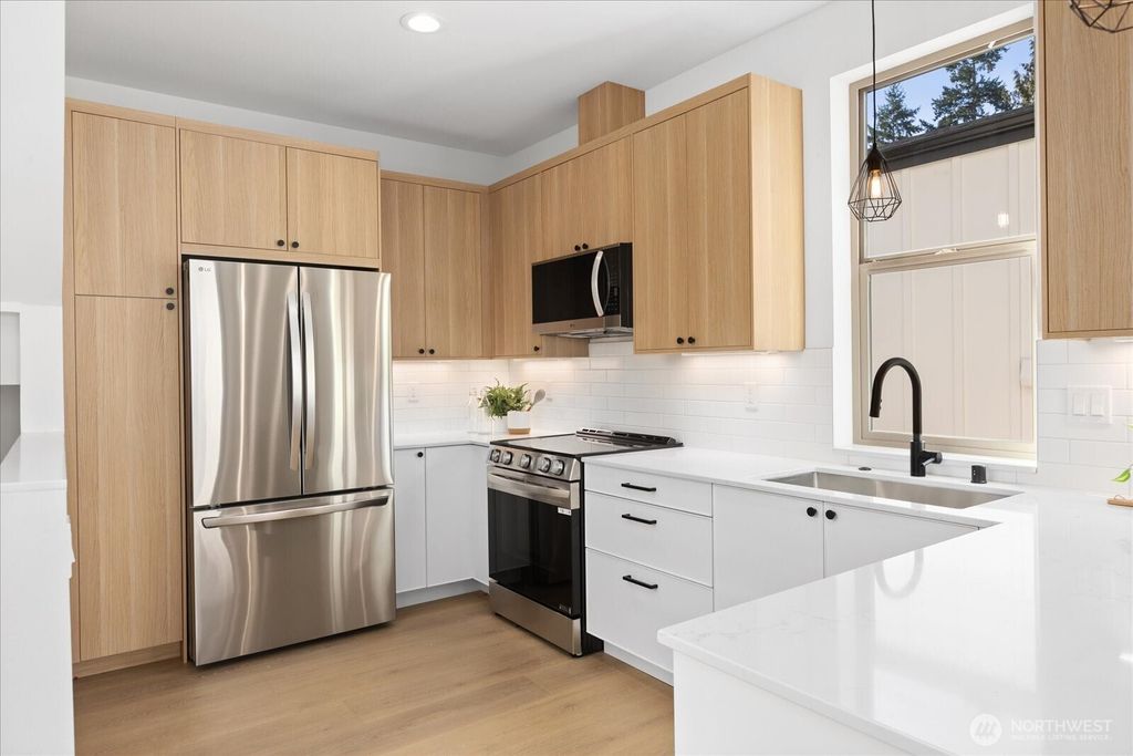 Photo of 12044 Hiram Place NE #A, Seattle, WA 98125 (MLS # 2473288)