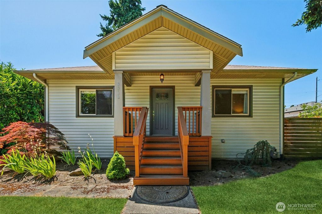Photo of 8811 35th Avenue SW, Seattle, WA 98126 (MLS # 2409865)