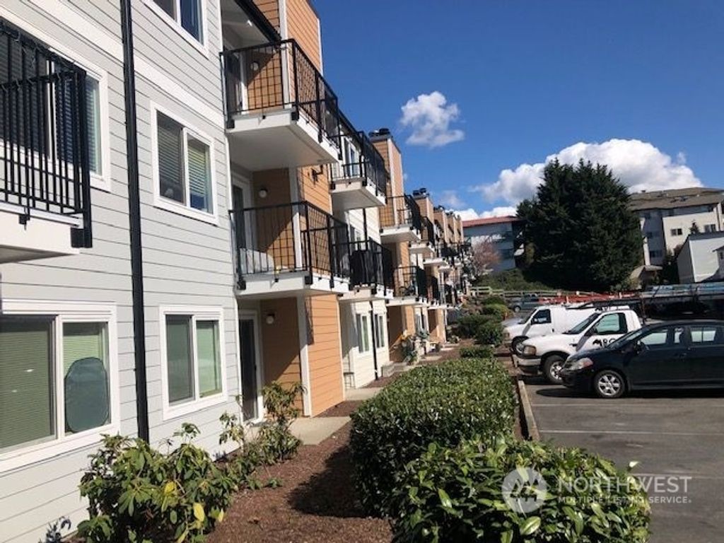 Photo of 15210 S MACADAM Road #D210, Tukwila, WA 98188 (MLS # 2212063)