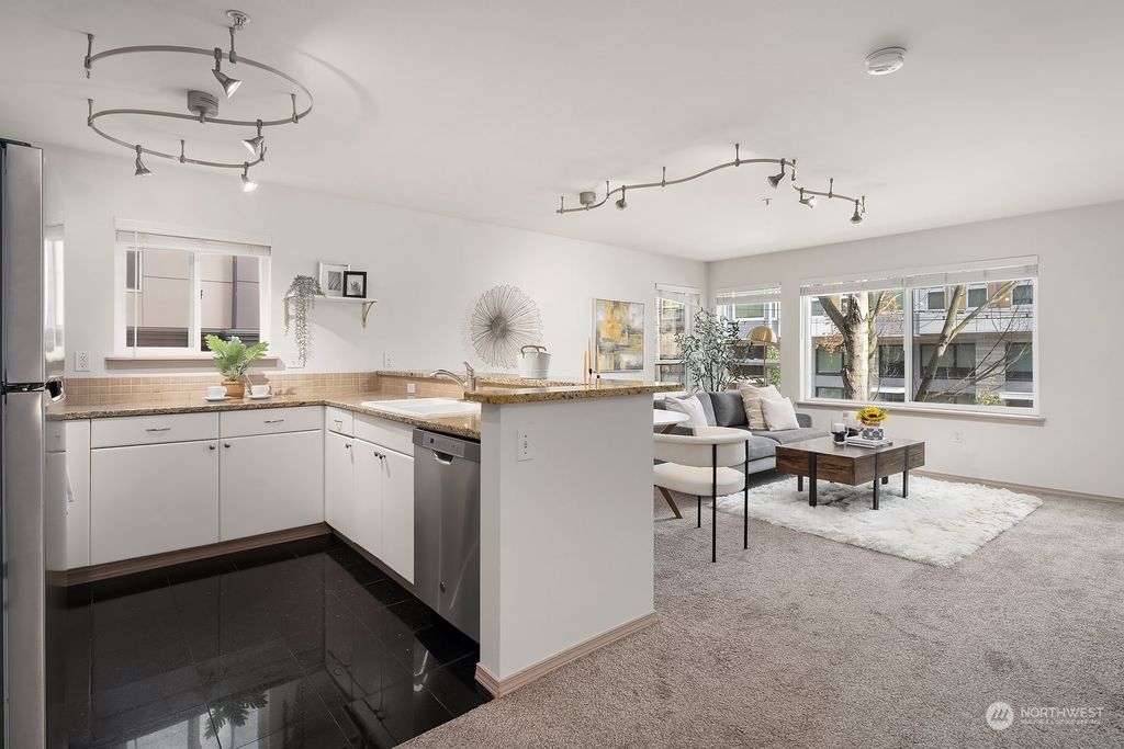 Photo of 323 Queen Anne Avenue N #207, Seattle, WA 98109 (MLS # 2136489)