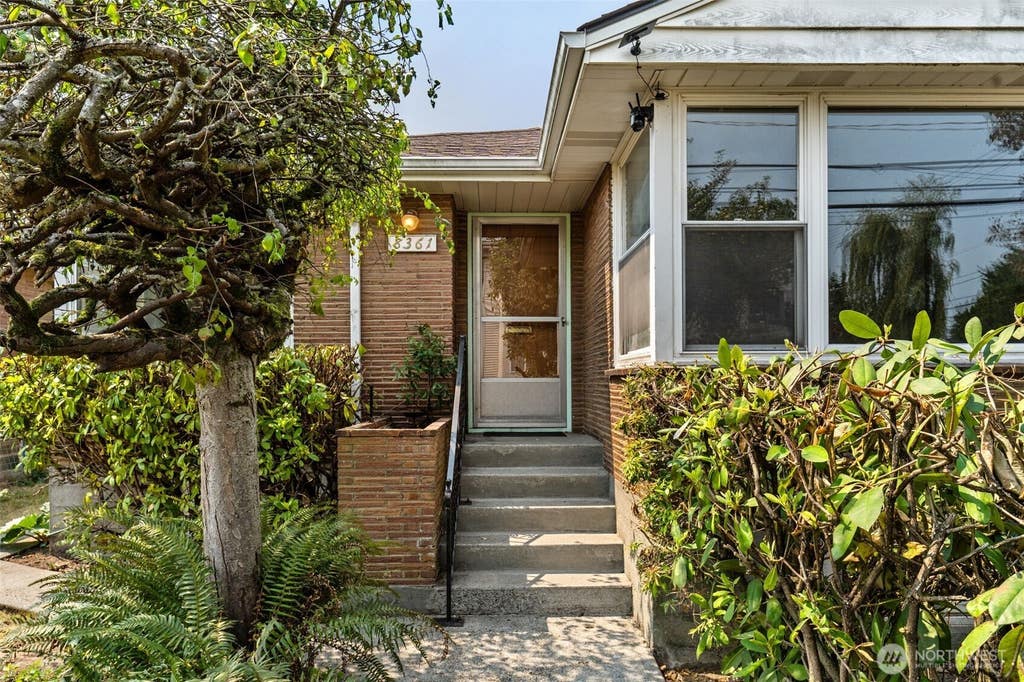 Photo of 8361 30th Avenue NW, Seattle, WA 98117 (MLS # 2565284)