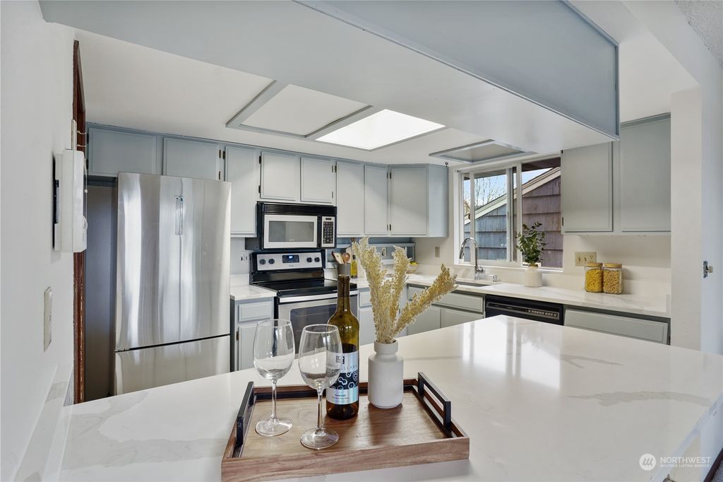 Photo of 9447 34th Avenue SW, Seattle, WA 98126 (MLS # 2317422)
