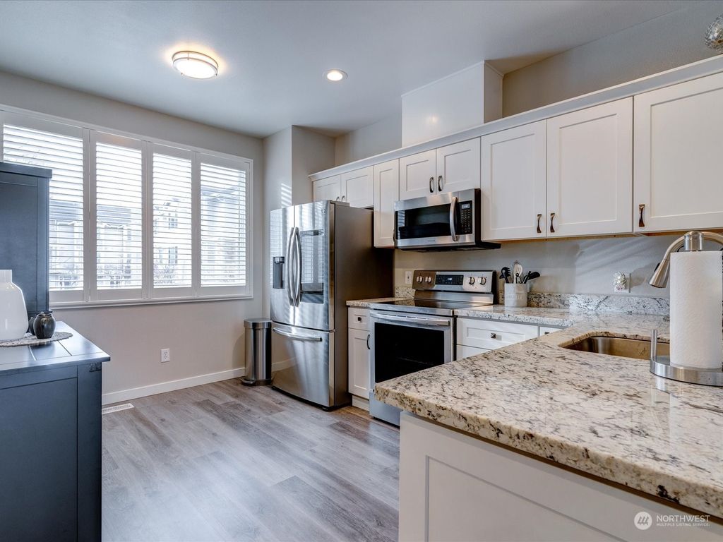 Photo of 16351 118th Lane NE #38-5, Bothell, WA 98011 (MLS # 2024935)