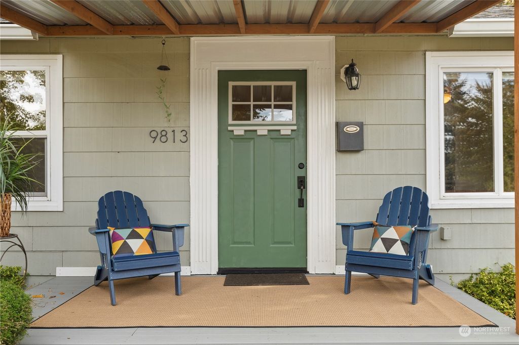Photo of 9813 31st Avenue SW, Seattle, WA 98126 (MLS # 2326564)