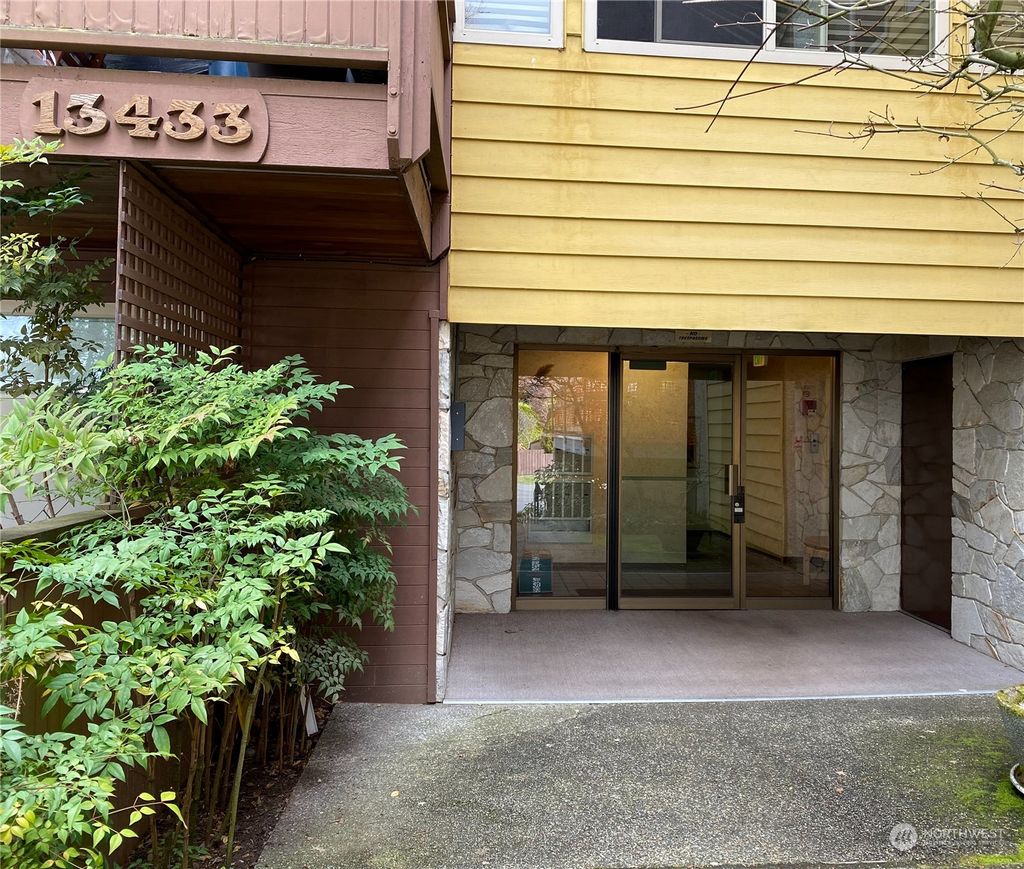 Photo of 13433 Roosevelt Way N #103, Seattle, WA 98133 (MLS # 2049098)