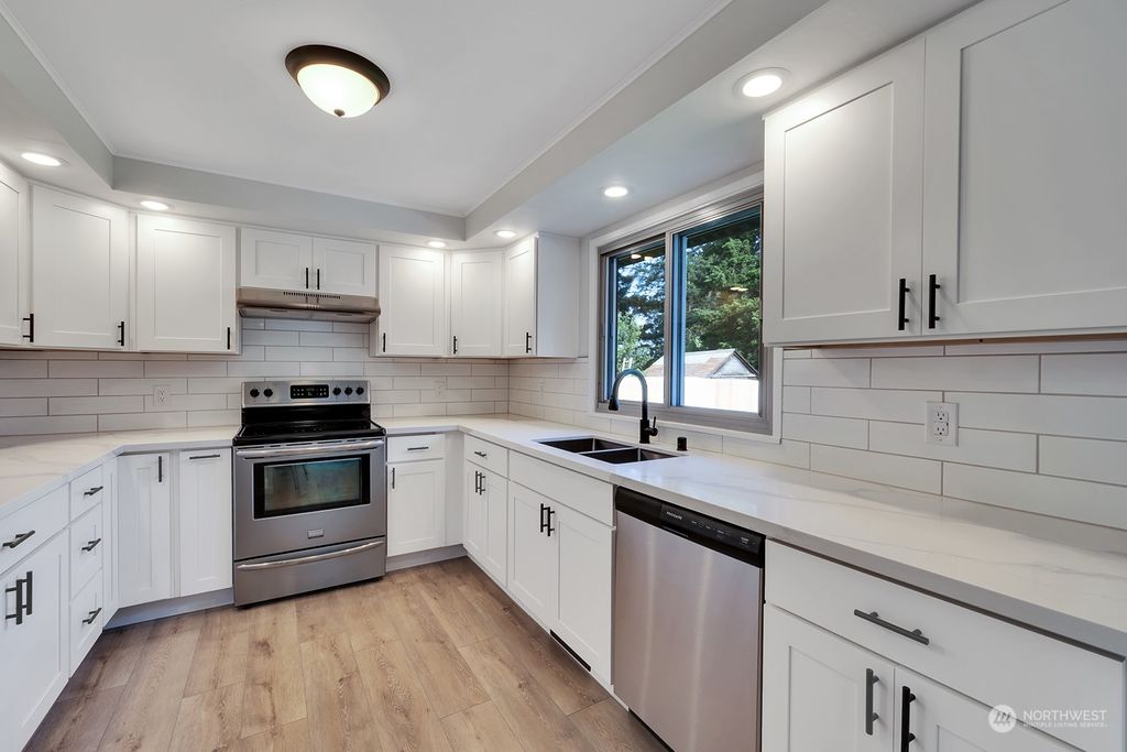 Photo of 2506 S 209th Place, SeaTac, WA 98198 (MLS # 2245464)