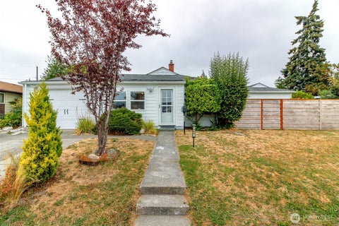 Photo of 1005 E 57th Street, Tacoma, WA 98404 (MLS # 2569404)