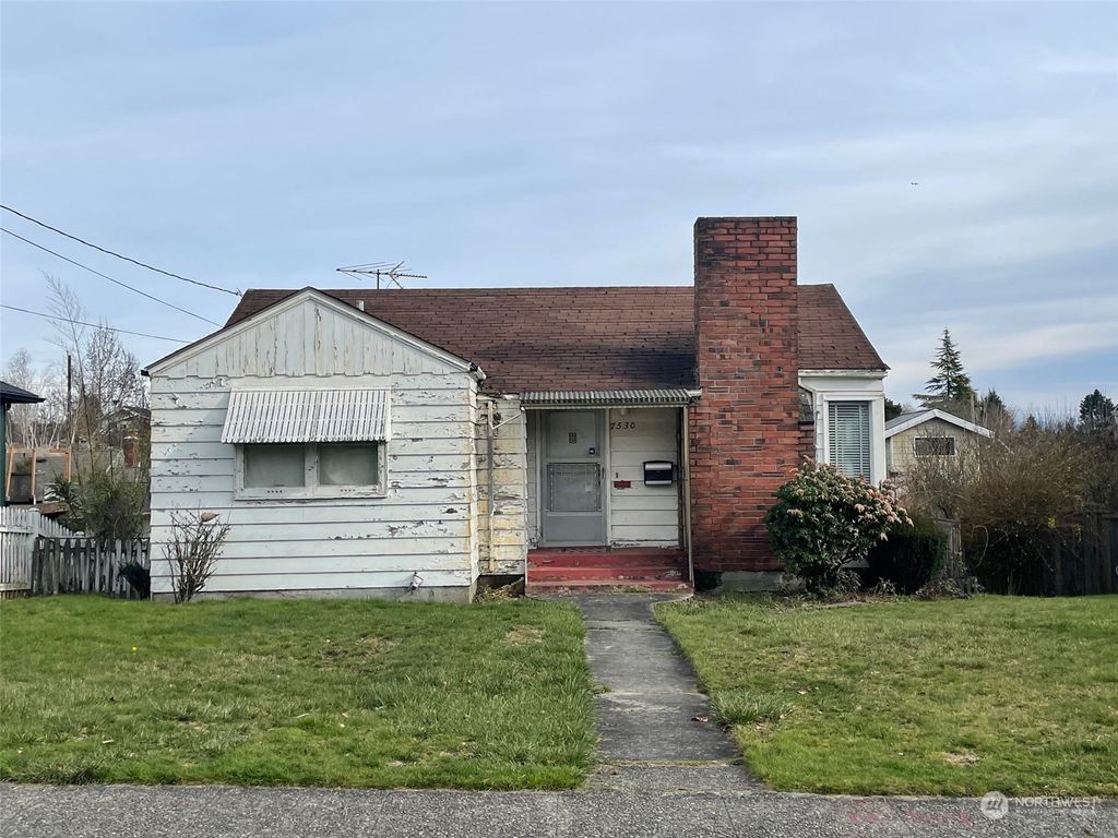 Photo of 7530 30th Avenue NW, Seattle, WA 98117 (MLS # 2200459)