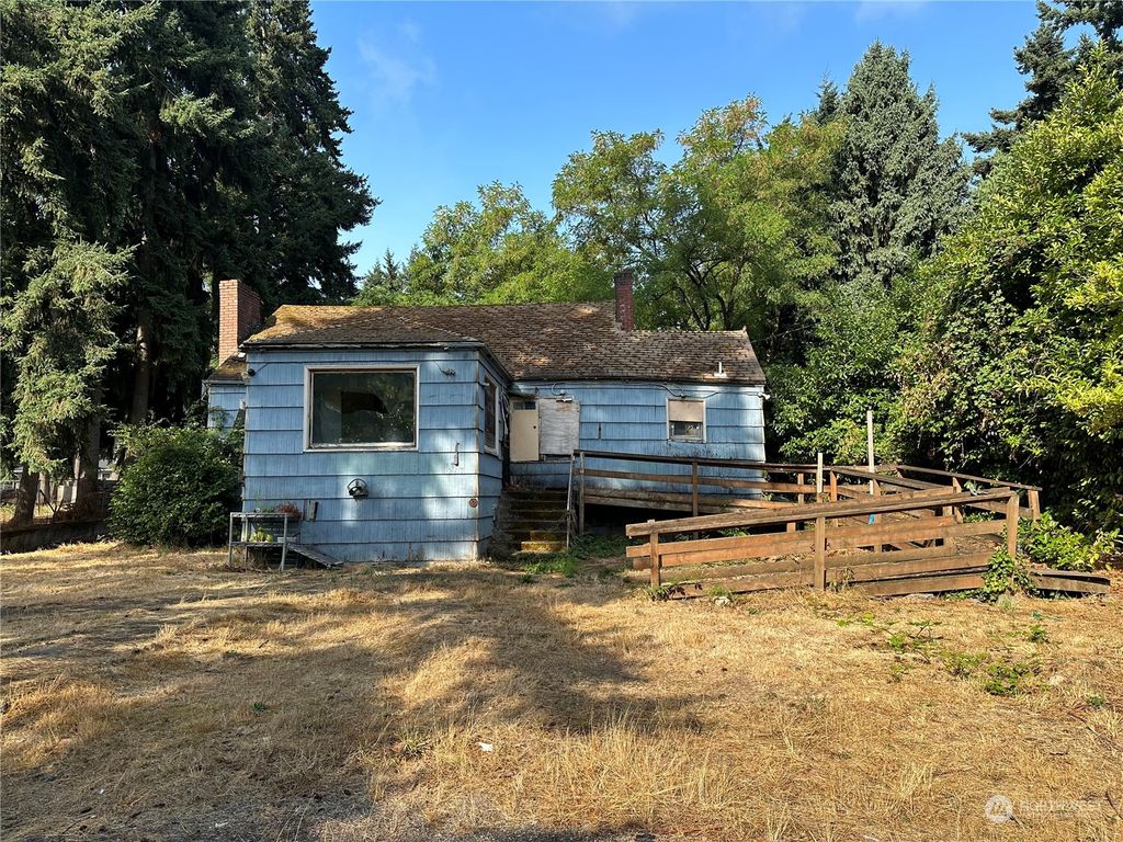 Photo of 12215 8th Avenue S, Seattle, WA 98168 (MLS # 2155337)