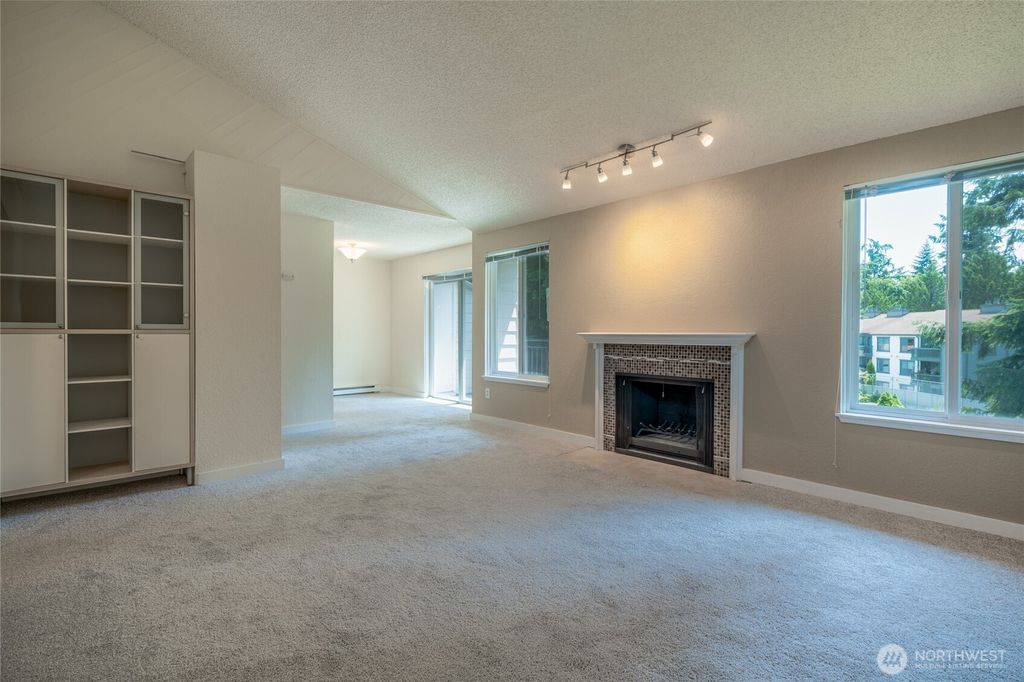 Photo of 12617 NE 130th Way #E303, Kirkland, WA 98034 (MLS # 2394097)