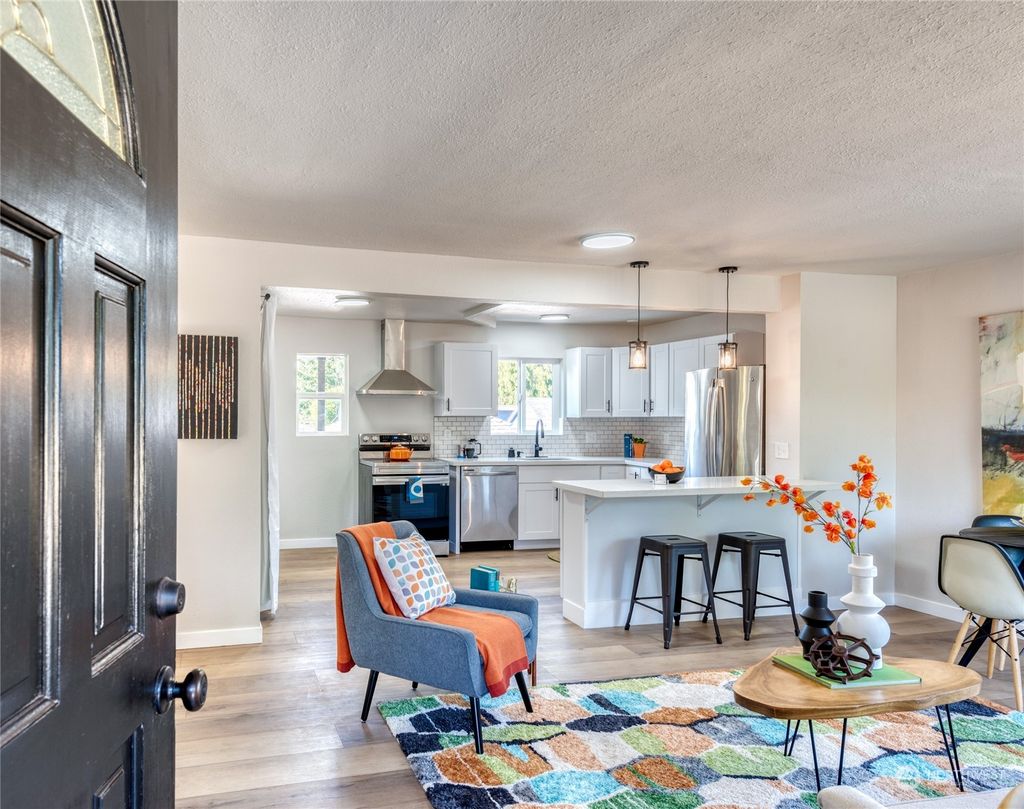 Photo of 4116 SW 104th Street, Seattle, WA 98146 (MLS # 2144920)