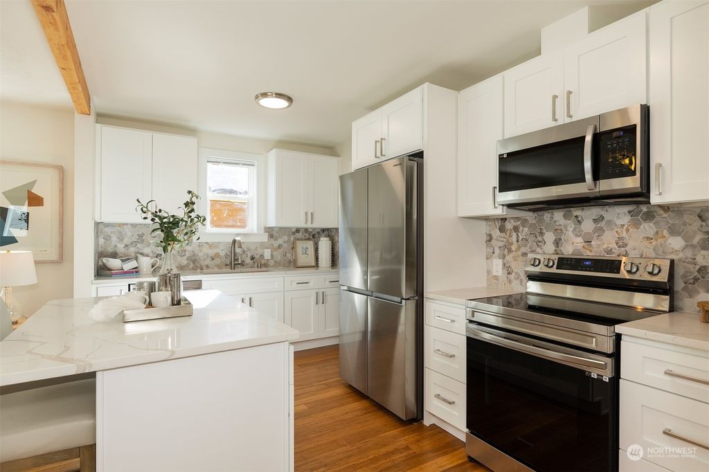 Photo of 7121 31st Avenue SW, Seattle, WA 98126 (MLS # 2034763)