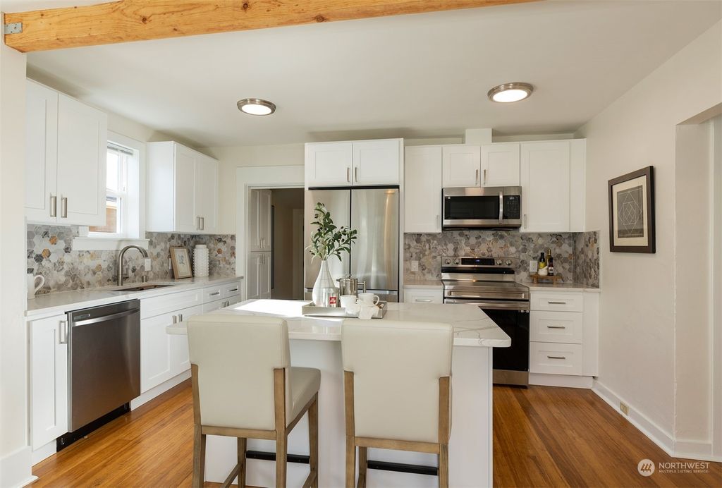 Photo of 7121 31st Avenue SW, Seattle, WA 98126 (MLS # 2034763)