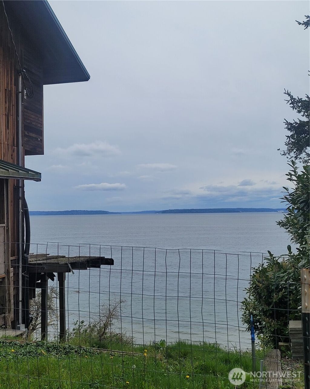Photo of 2318 Perkins Lane W, Seattle, WA 98199 (MLS # 2394959)