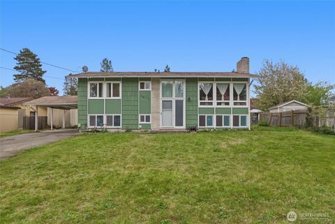 Photo of 1817 S 262nd Place, Des Moines, WA 98198 (MLS # 2511137)