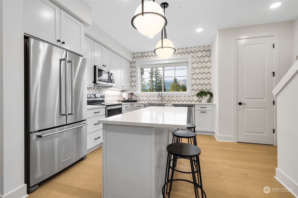 Photo of 1209 Boulder Way SE #303, North Bend, WA 98045 (MLS # 2144552)