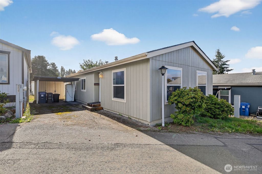 Photo of 3433 S 182nd St St, SeaTac, WA 98188 (MLS # 2443193)