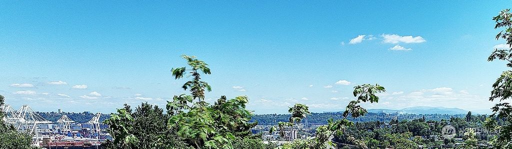 Photo of 3429 33rd Avenue SW, Seattle, WA 98126 (MLS # 2258789)