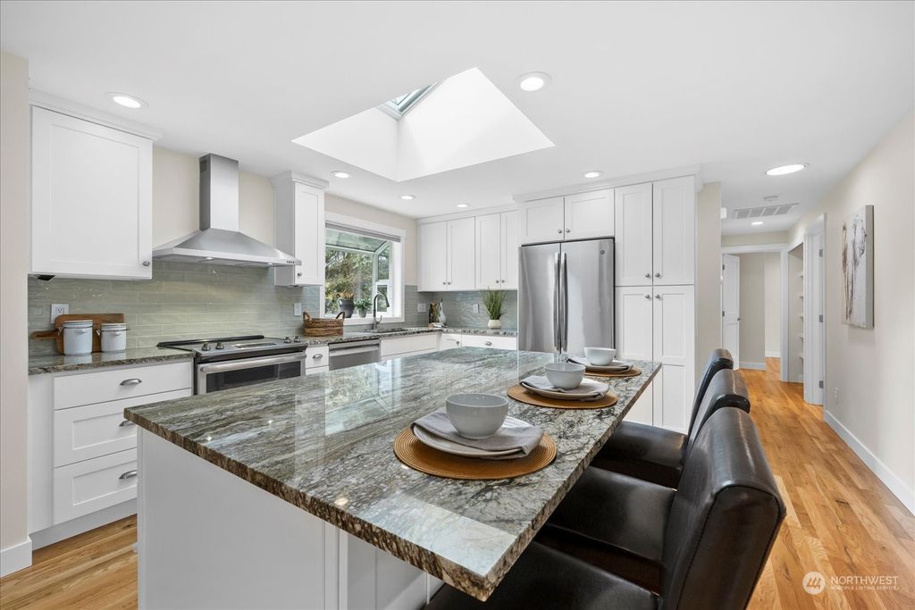 Photo of 8726 NE 139th Street, Kirkland, WA 98034 (MLS # 2231549)