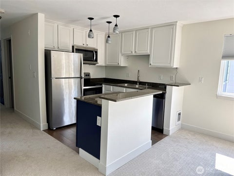 Photo of 20324 Bothell Everett Hwy #F301, Bothell, WA 98012 (MLS # 2570555)