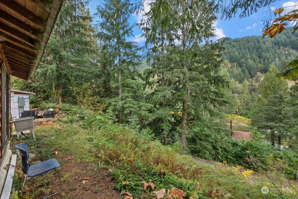 Photo of 52932 Riverside Road, Gold Bar, WA 98251 (MLS # 2302976)