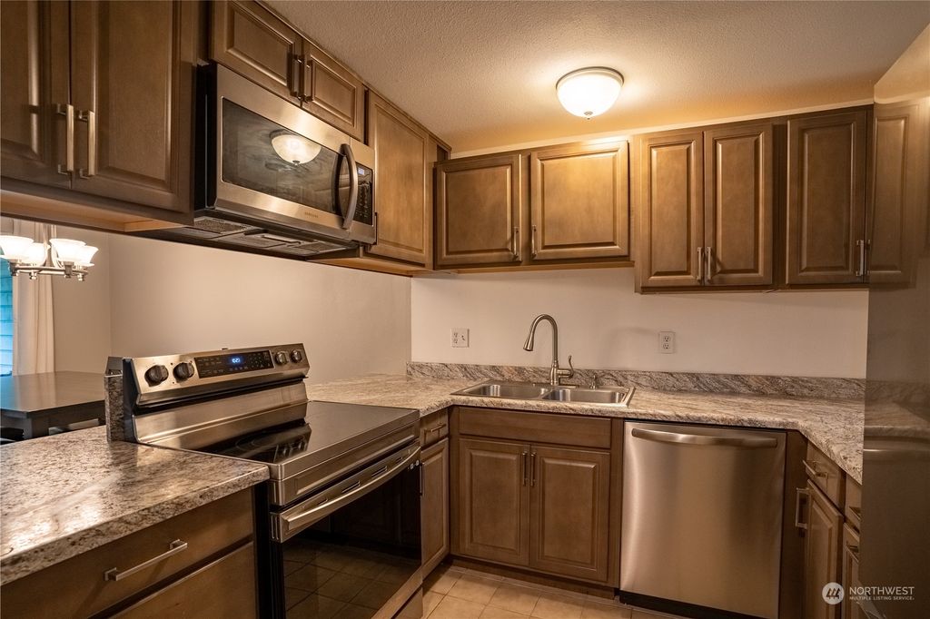 Photo of 4012 S 158th Street #G-24, Tukwila, WA 98188 (MLS # 2168856)