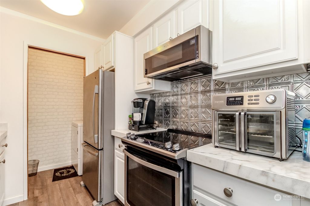 Photo of 21925 7th Avenue S #A103, Des Moines, WA 98198 (MLS # 2191410)