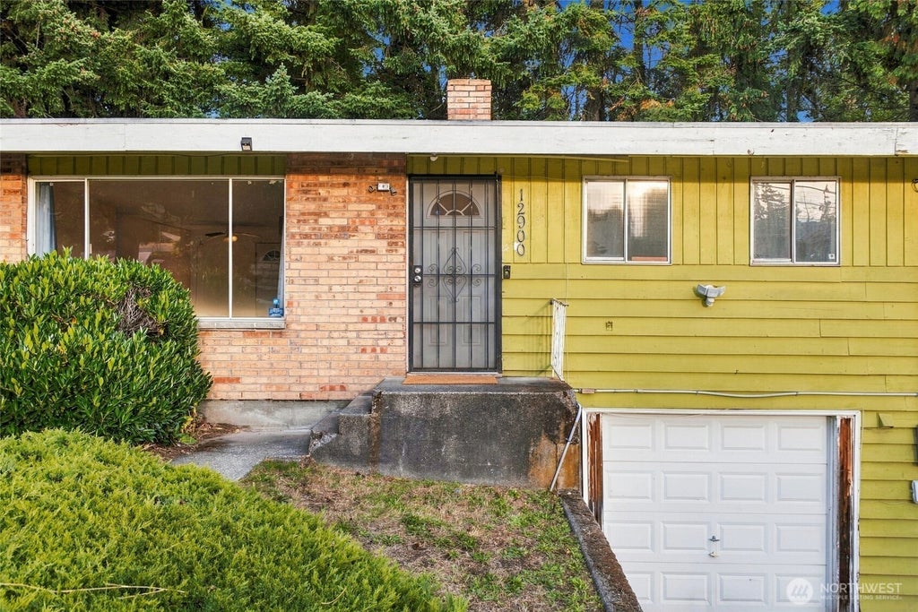 Photo of 12900 76th Avenue S, Seattle, WA 98178 (MLS # 2590509)