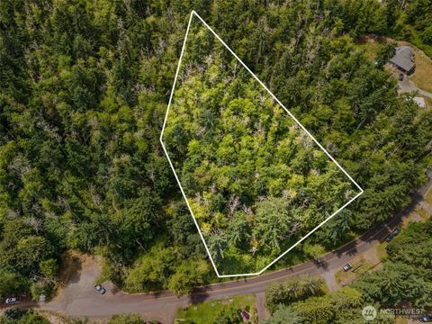 Photo of 7605 Sandy Point Beach Road NE, Olympia, WA 98516 (MLS # 2402561)