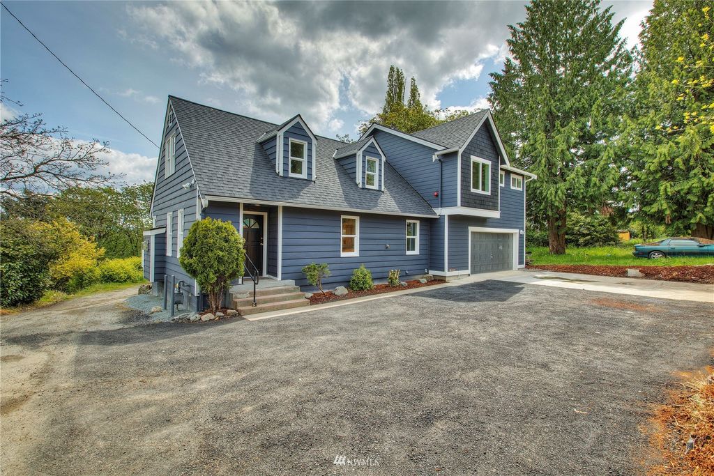 Photo of 12222 Military Road S, Seattle, WA 98168 (MLS # 1934143)
