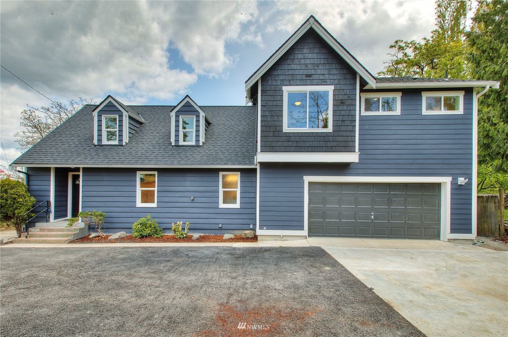 Photo of 12222 Military Road S, Seattle, WA 98168 (MLS # 1934143)