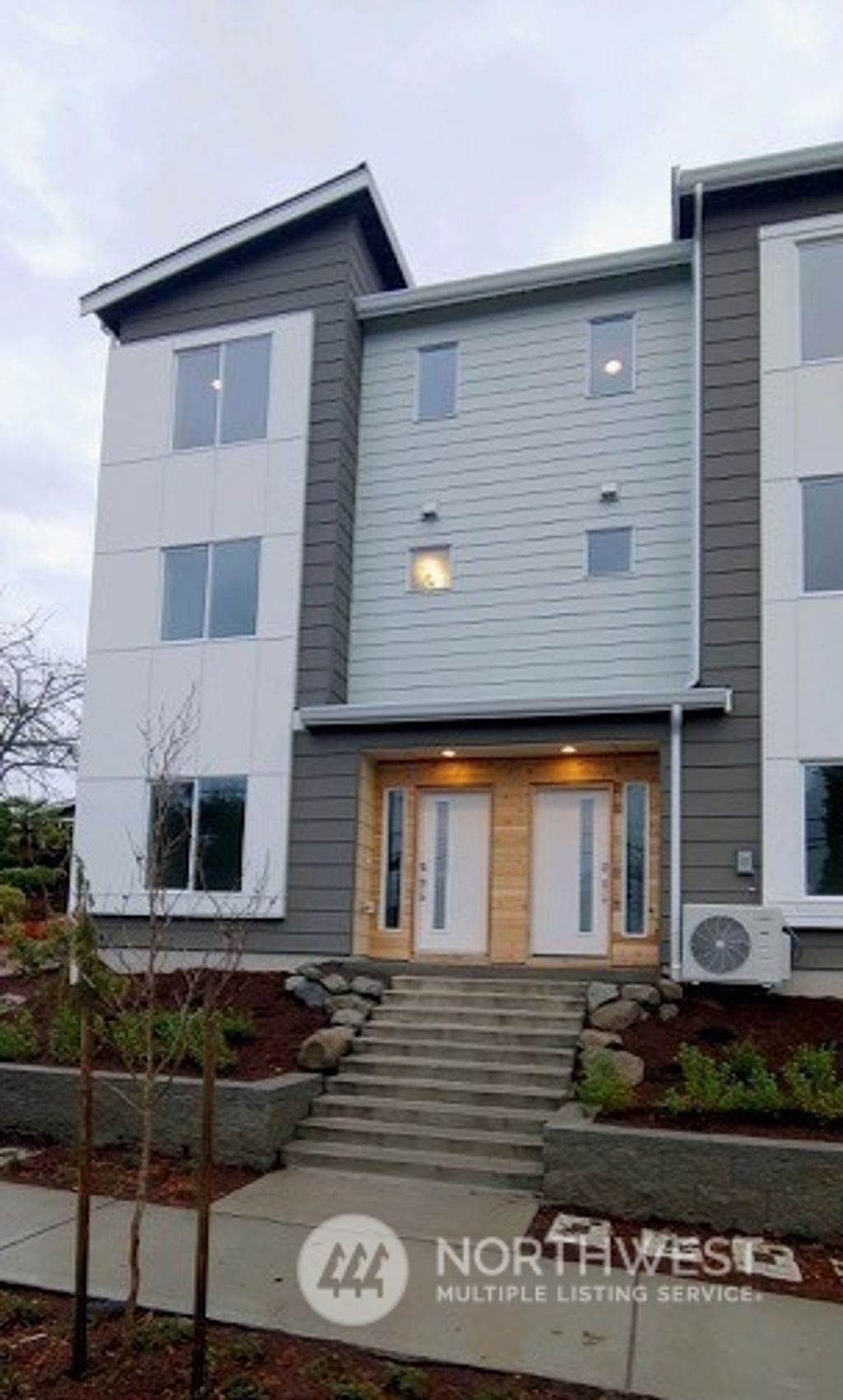 Photo of 18008 12th Avenue NE #F, Shoreline, WA 98155 (MLS # 2028456)