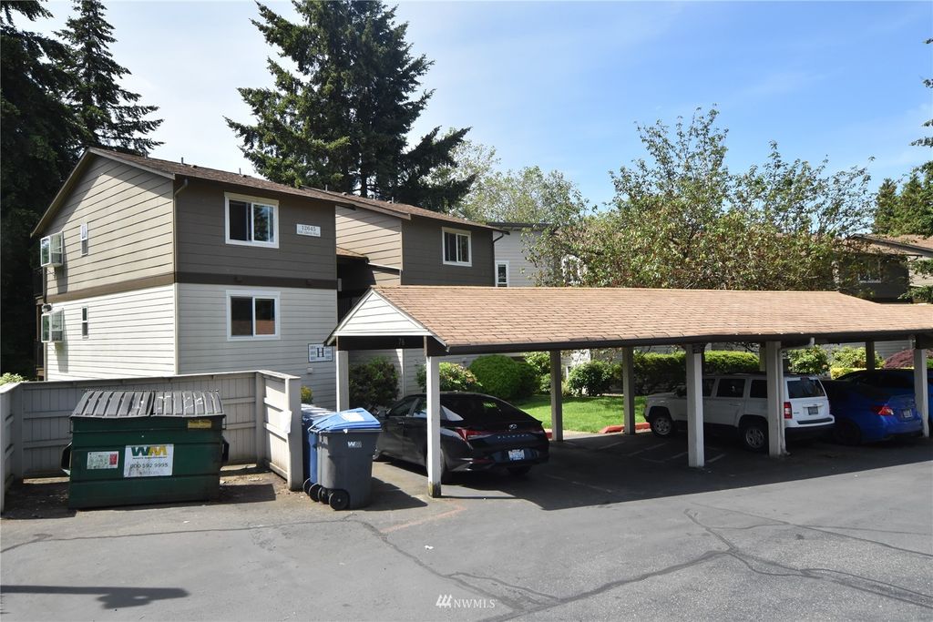 Photo of 12645 NE 130th Way #H101, Kirkland, WA 98034 (MLS # 1961471)