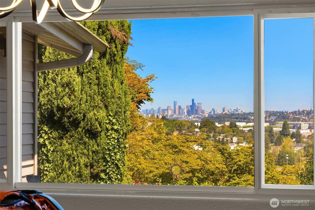 Photo of 1405 S 100th Street, Seattle, WA 98168 (MLS # 2574696)