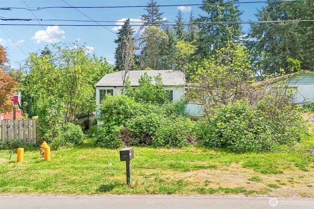 Photo of 12242 10th Avenue S, Seattle, WA 98168 (MLS # 2516668)