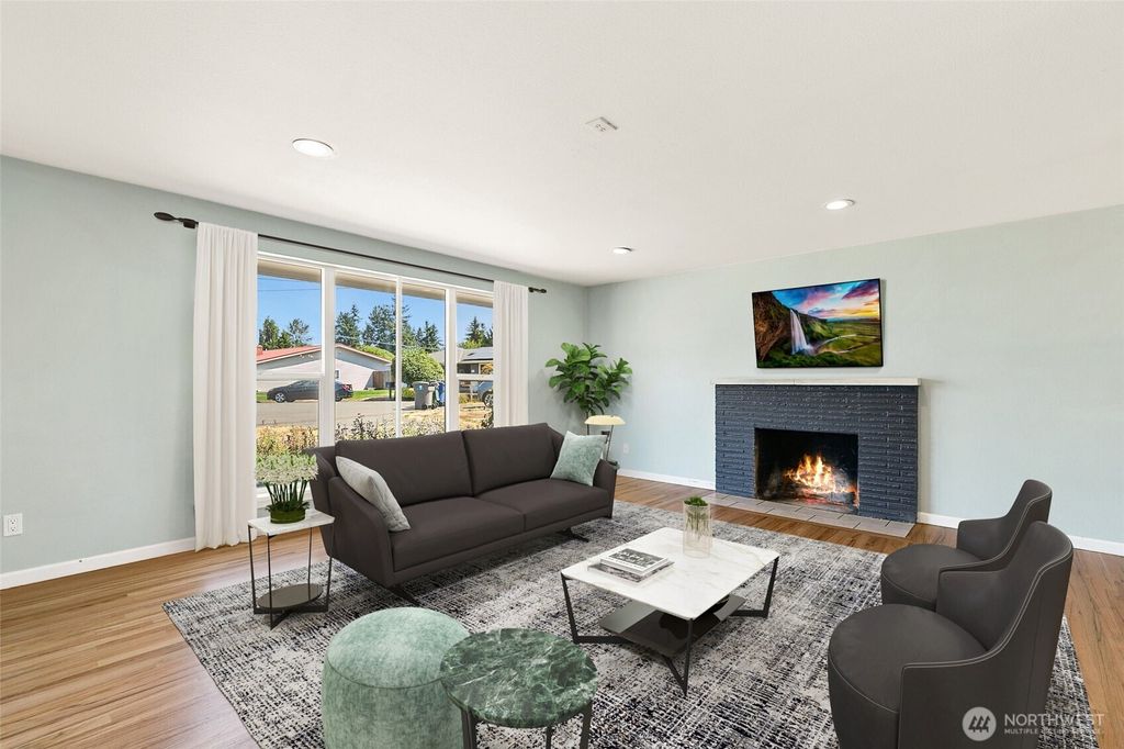 Photo of 479 Harrington Avenue NE, Renton, WA 98056 (MLS # 2410683)