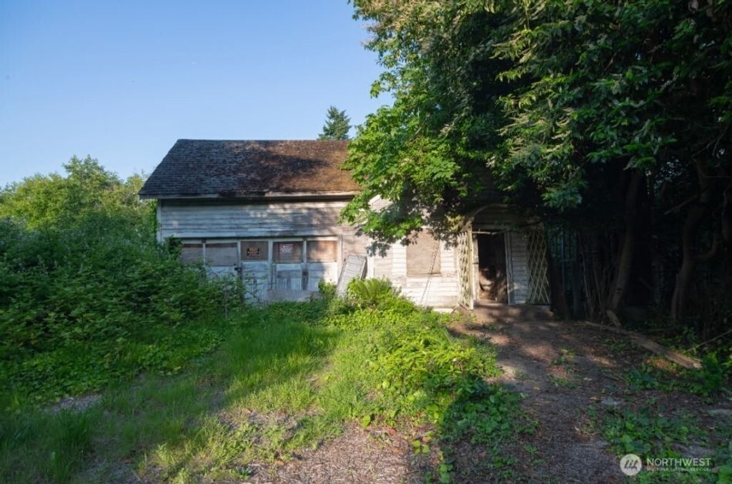 Photo of 9663 Renton Avenue S, Seattle, WA 98118 (MLS # 2402450)