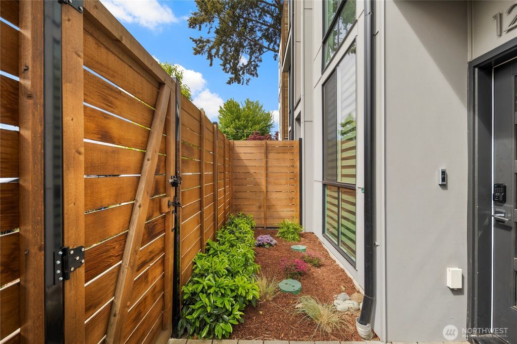 Photo of 12002 31st Avenue NE, Seattle, WA 98125 (MLS # 2525956)