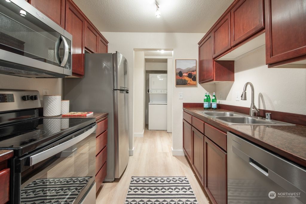 Photo of 750 N 143rd Street #101, Seattle, WA 98133 (MLS # 2233736)