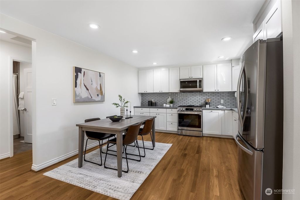 Photo of 9215 30th Avenue SW, Seattle, WA 98126 (MLS # 2218880)