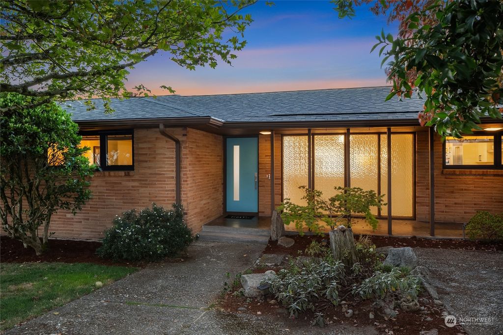 Photo of 8803 38th Avenue SW, Seattle, WA 98126 (MLS # 2234033)