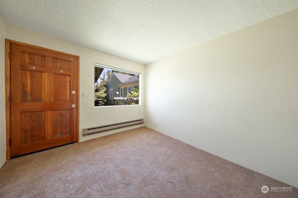 Photo of 309 N 74th Street, Seattle, WA 98103 (MLS # 2131836)