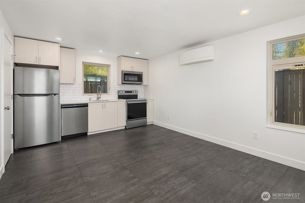 Photo of 3323 Martin Luther King Jr Way S, Seattle, WA 98144 (MLS # 2591404)