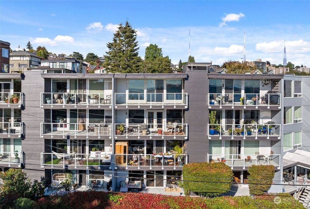 Photo of 500 W Olympic Place #404, Seattle, WA 98119 (MLS # 2294649)