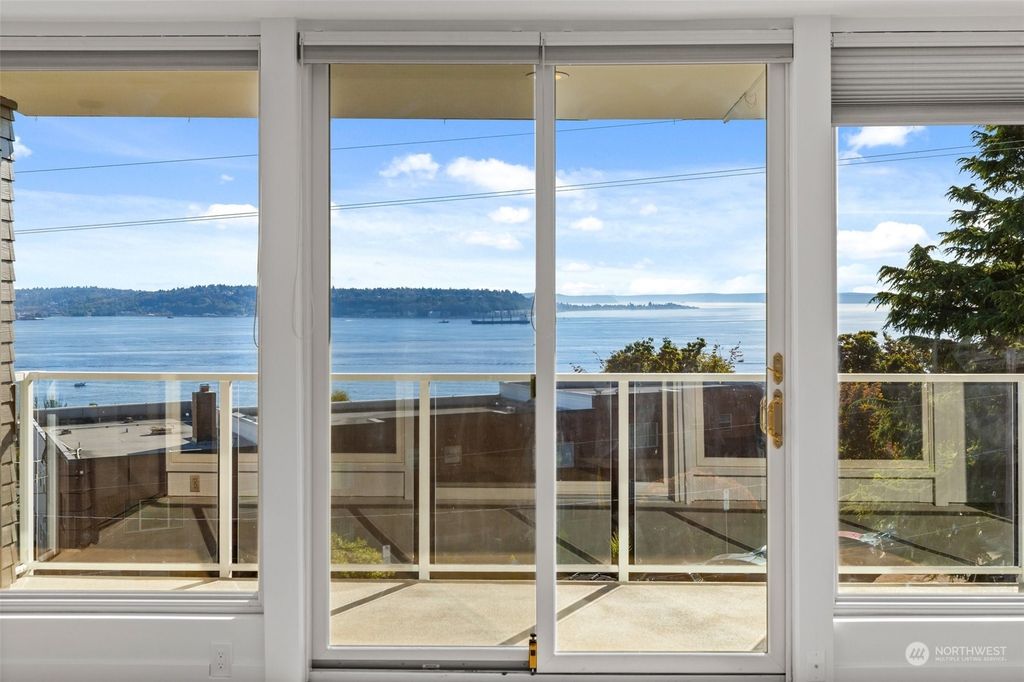Photo of 500 W Olympic Place #404, Seattle, WA 98119 (MLS # 2294649)