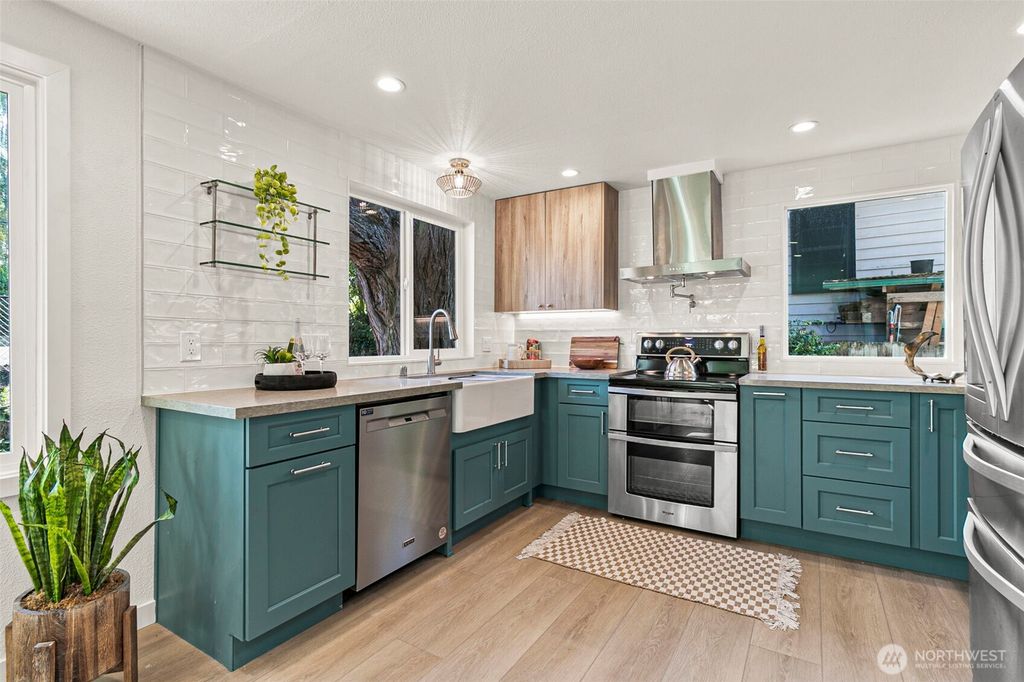 Photo of 12077 75th Avenue S, Seattle, WA 98178 (MLS # 2437032)