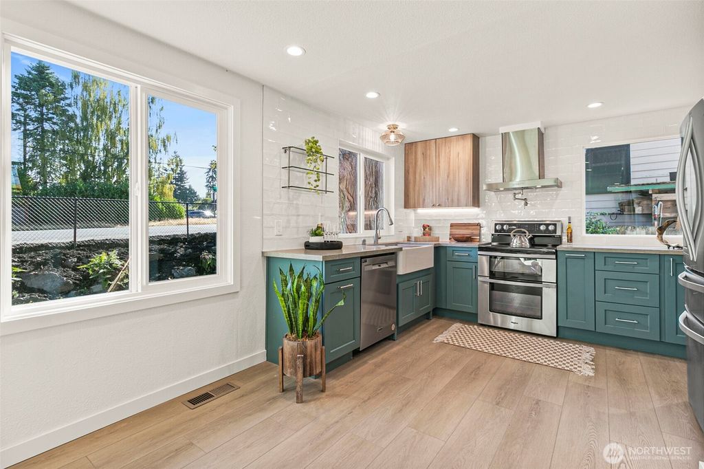 Photo of 12077 75th Avenue S, Seattle, WA 98178 (MLS # 2437032)