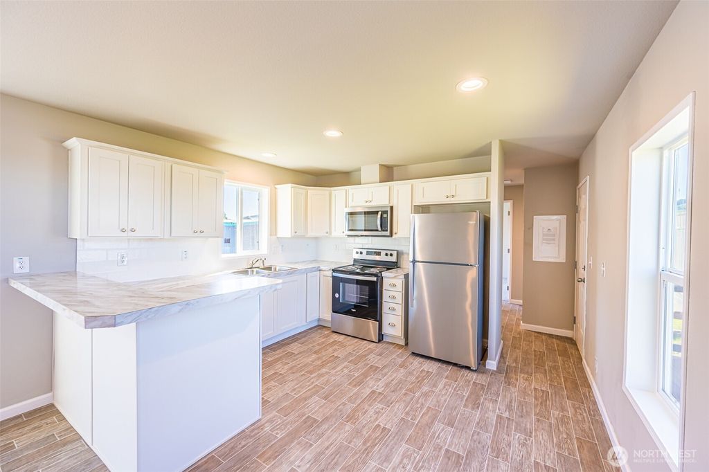 Photo of 621 Calawah Way #61, Forks, WA 98331 (MLS # 2500305)