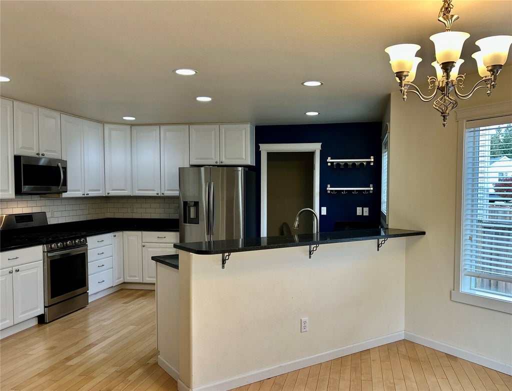 Photo of 29734 215th Terrace SE, Kent, WA 98042 (MLS # 2593652)